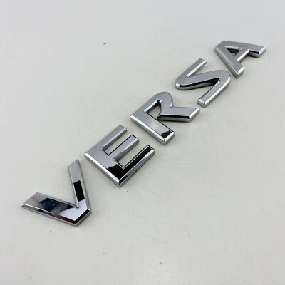 2007-2012 Nissan Versa emblema logotipo símbolo letras porta porta porta porta porta traseira fabricante de equipamento original G12 - Imagem 1 de 4