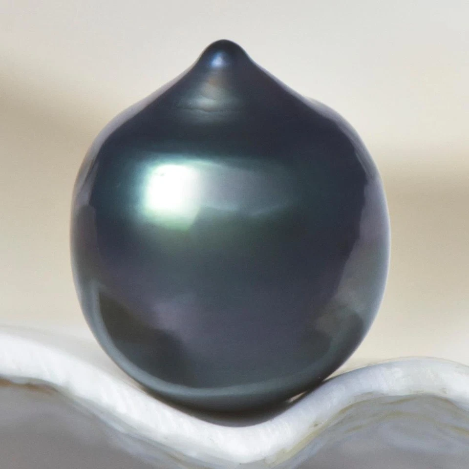 12.20cts Tahitian South Sea Pearl 13.87mm Charcoal Black Baroque 2.44g undrilled - Image 1 of 4