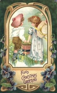 Cubo de transporte de saludos de Navidad cariñoso niña y niño UDB 1909 postal - Imagen 1 de 2