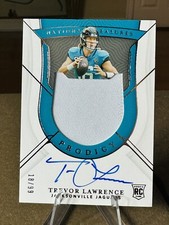 Trevor Lawrence National Treasures Prodigy On Card Auto /99 RPA Rookie patch...