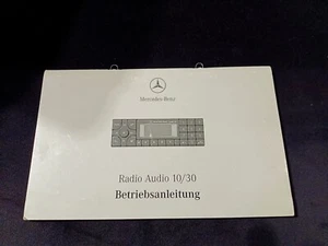 Mercedes-Benz A1685847383 Audio 10/30 Becker radio instruction OE - Zdjęcie 1 z 2