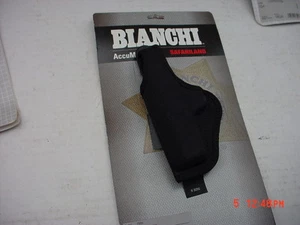 Bianchi Left Handed Holster Black Thumbsnap 17730 Colt Mustang - Picture 1 of 2