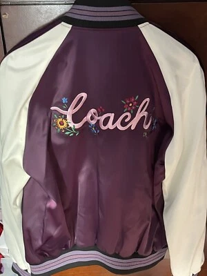 Chaqueta universitaria Coach para mujer Foto 1 de 4