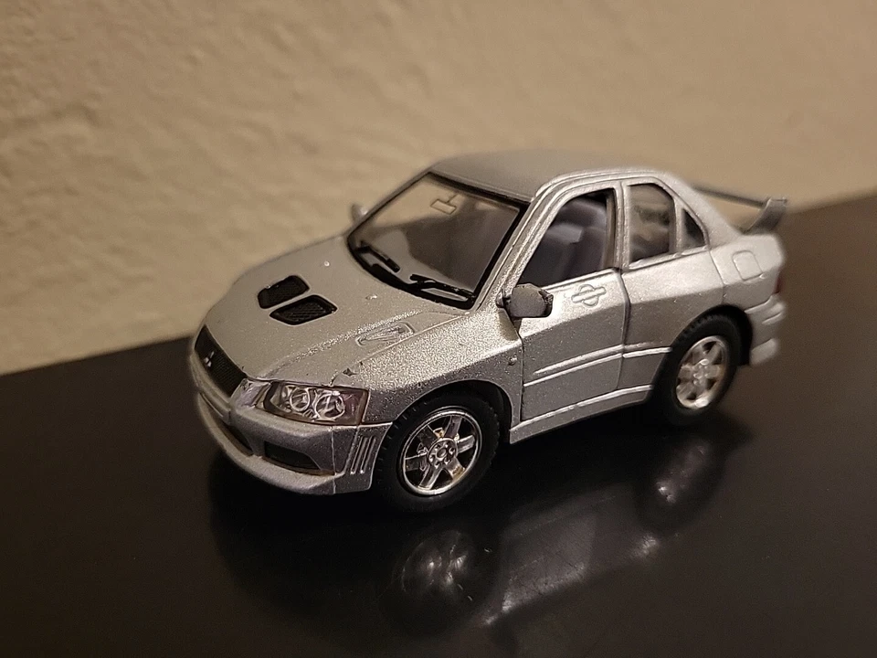 Kinsfun Mitsubishi Evolution VII, vehículo de juguete fundido a presión plateado, ¡acción de retroceso! Foto 1 de 4