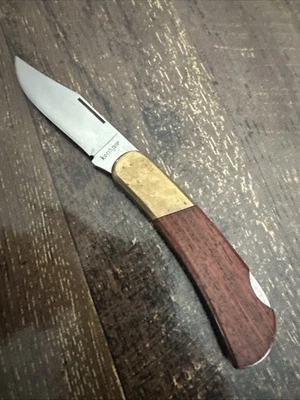 Cuchillo plegable vintage Kershaw 2605 Lockback con mango de nogal Kai Japón Foto 1 de 4