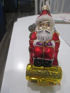 Polonaise Ornament Weihnachtsmann auf Schlitten mit Spielzeug 2002 - Bild 1 von 7