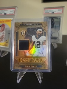 2023 Chris Olave Panini Gold Standard Heart of Gold Jersey Patch /199 Saints