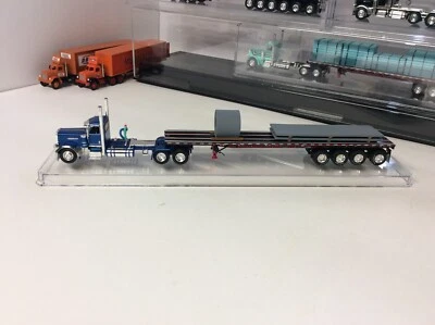 DCP Peterbilt 389 w/ 4 axle Wilson 平板 钢质负载. 不是匹配的套装。 — 第 1/4 张图片