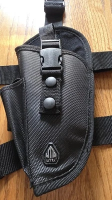 Funda táctica para pierna izquierda UTG para cuadro mediano grande Foto 1 de 3