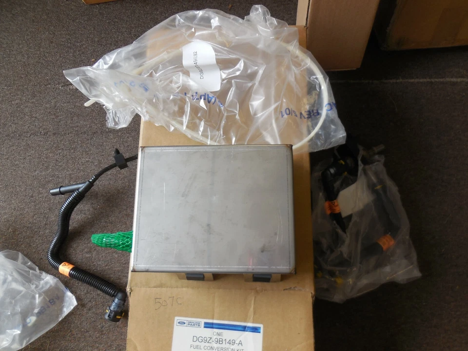 New OEM 2013 - 2015 Ford Fusion Hybrid Fuel Conversion Kit DG9Z-9B149-A - Image 1 of 1