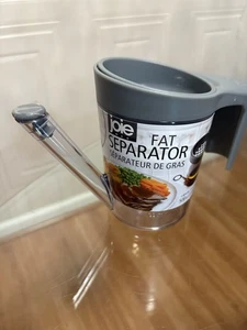 Brandneu Joie Fettabscheider Soße Rot 2 Tassen Ausgießer Sieb Küche. - Bild 1 von 5