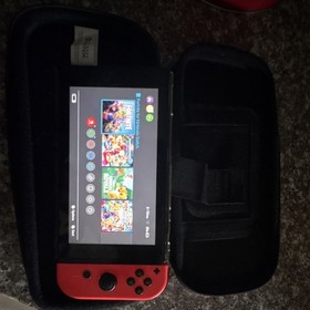 Nintendo Switch Handheld System Red Joy-Con Multiplayer with Mario Carrying Case