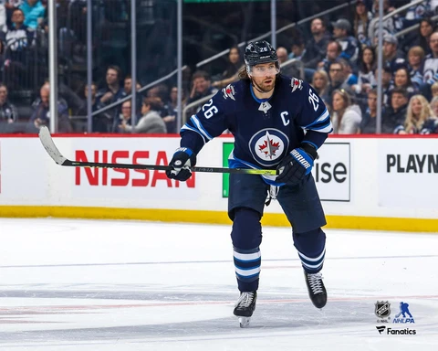 Blake Wheeler Winnipeg Jets Unsigned Blue Jersey Skating Photograph Cover