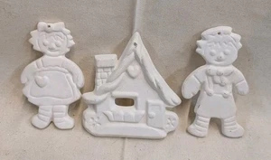 Ceramic Unpainted Raggedy Ann, Andy, and A House Christmas Ornaments - Picture 1 of 2