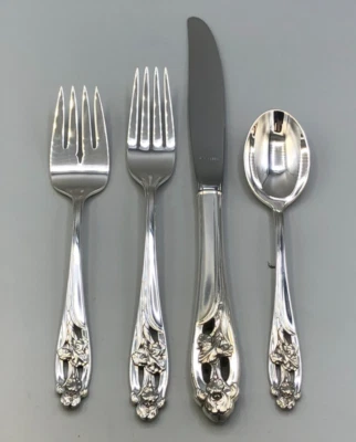 Iris de plata de ley internacional 4 piezas ajuste de lugar, ligeramente usado Foto 1 de 4