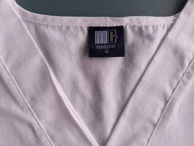 Top exfoliante blanco talla M de Med Gear. Excelente estado. Foto 1 de 4
