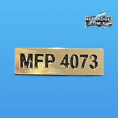 Mad Max badge - Max Rockatansky's  MFP 4073 Number Badge - Image 1 of 2