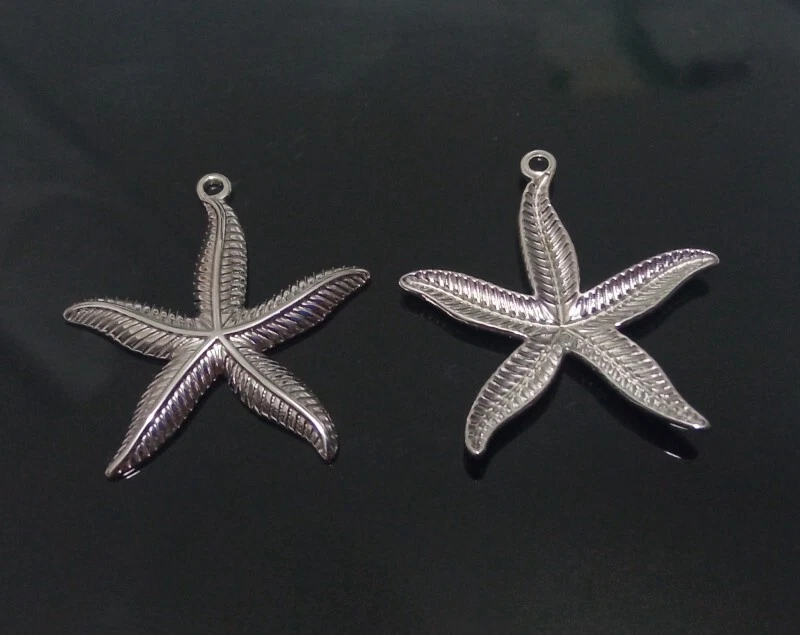 2pz ciondolo stella marina  in acciaio inox 29x27mm colore argento scuro - Immagine 1 di 1