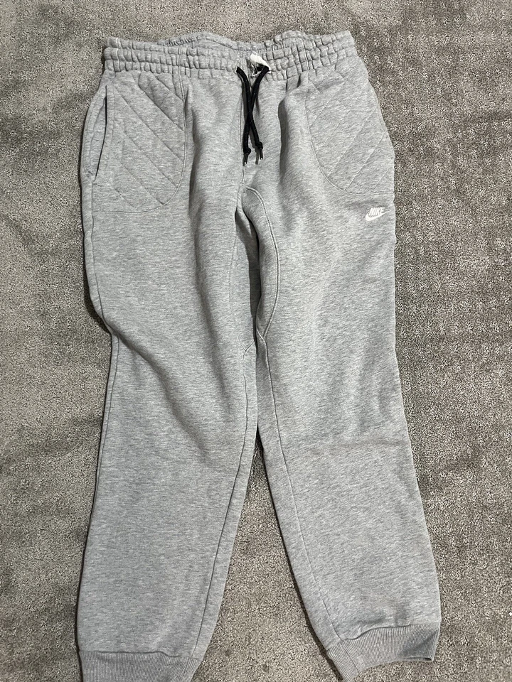 Pantalón Nike NSW FB 624182-063 (gris jaspeado) Medium Distres Foto 1 de 4