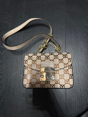 valentino bolsos bandolera oro rosa monograma  Foto 1 de 3