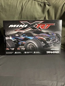 TRAXXAS Mini XRT BRUSHLESS 4x4 2S 40MPH 3S 55MPH New Orange - Picture 1 of 6