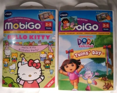V-tech MobiGo Hello Kitty & Dora the Explorer Games 3-5 Years Reading  - Image 1 of 4