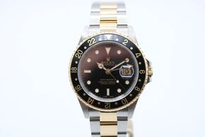 Rolex Steel and Gold GMT Master II 16713 Full Set 2004 - Picture 1 of 13