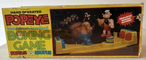 Gioco di boxe vintage 1981 Harmony Kelly Popeye vs Brutus Knockdown Knockout con scatola - Foto 1 di 8