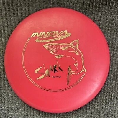USED Innova DX Shark 170g Red/Gold Foil Midrange Golf Disc - Image 1 of 3
