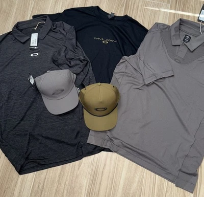 Oakley SWAG Bag NEW Golf Polos(2)/Tshirt/Hats(2) - Image 1 of 4