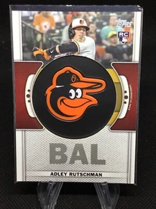 ADLEY RUTSCHMAN 2023 Topps Series 1 RC Commemorative Team Logo Patch Rookie RC - Picture 1 of 2