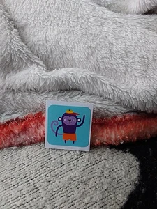 Purple Monkey Wearing A Hat And Orange Shorts Sticker - Picture 1 of 5