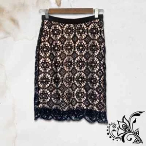Falda de encaje Christian Dior de lana y seda de longitud media negra para mujer EE. UU. 4 FR 36 - Imagen 1 de 10