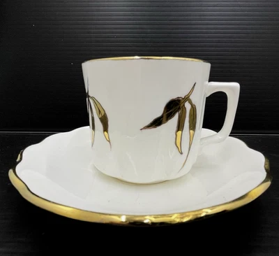 Vintage Hand painted gold gum leaves Fine Bone China Tea Cup & Saucer - image 1 of 4