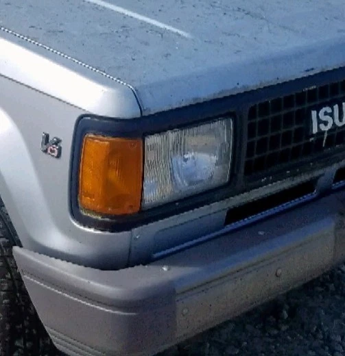 Faro pasajero derecho Isuzu Trooper: 1987, 1988, 1989, 1990, 1991 Foto 1 de 4