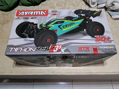 Buggy Arrma Typhon 1/8 223 Blx Brushless - Immagine 1 di 4