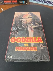 GODZILLA vs MEGALON VHS 1976 Twin Towers 9/11 Cover NEW SEALED Kaiju Toho *RARE* - Picture 1 of 6