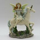 Vintage Figurine of a Young Blue Winged Fairy Astride a White Unicorn  4 3/4"