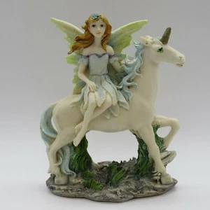 Vintage Figurine of a Young Blue Winged Fairy Astride a White Unicorn  4 3/4" - Picture 1 of 10