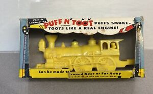 Vintage Puff N Toot plastic yellow Toy Train Whistle in box