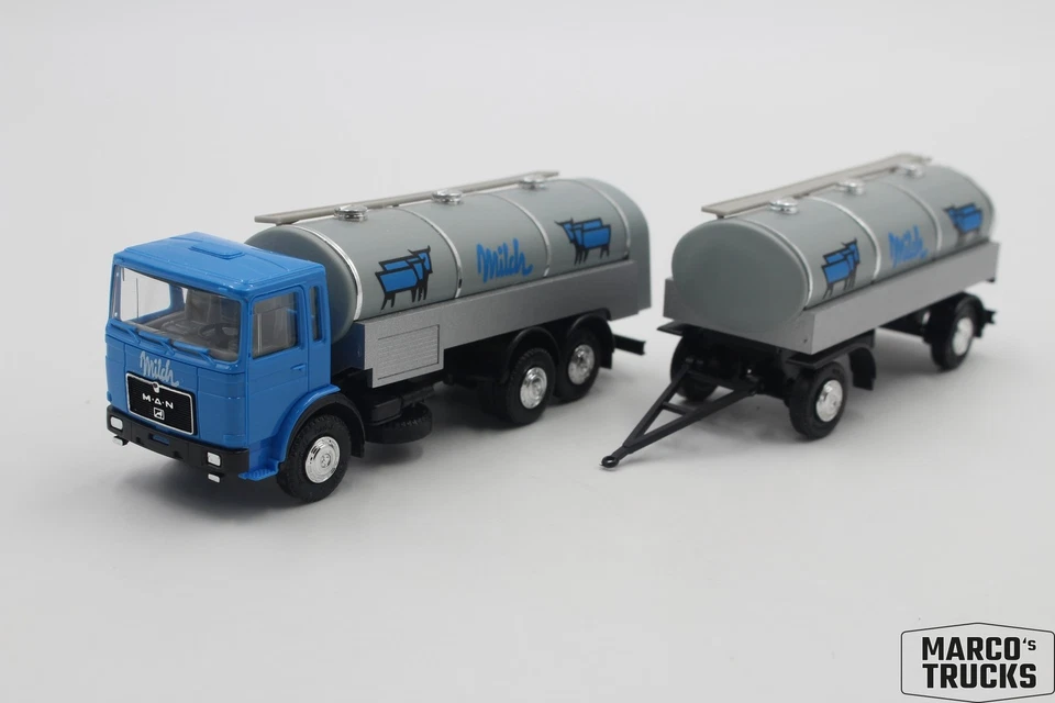 Herpa MAN F8 milk tank drawbar trailer truck 3-axle/2-axle gray/blue "Milch" 1:8 - Image 1 of 1