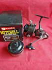 A GOOD VINTAGE MITCHELL MATCH 840 FISHING REEL WITH AN UNRELATED BOX