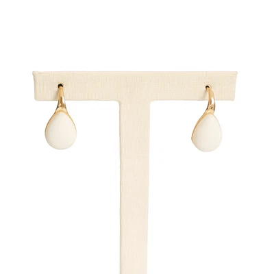 Pendientes de cabeza al ras de porcelana de oro Foto 1 de 4