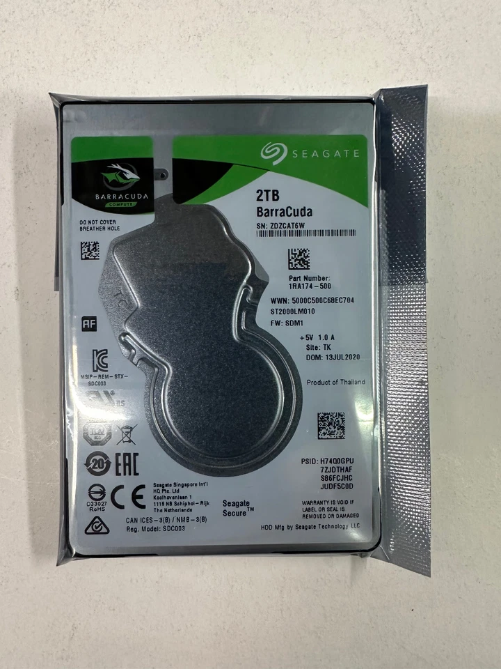 Seagate ST2000LM010 1RA174-500 TK Thailand SDM1 (ZDZ9) 2.5" 2TB Sata 7mm - Image 1 of 1