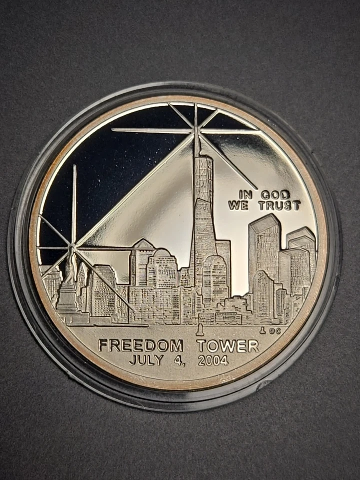 Freedom towers july 4 2004 , recovery Silver.100 Mil Clad.  - Image 1 of 4