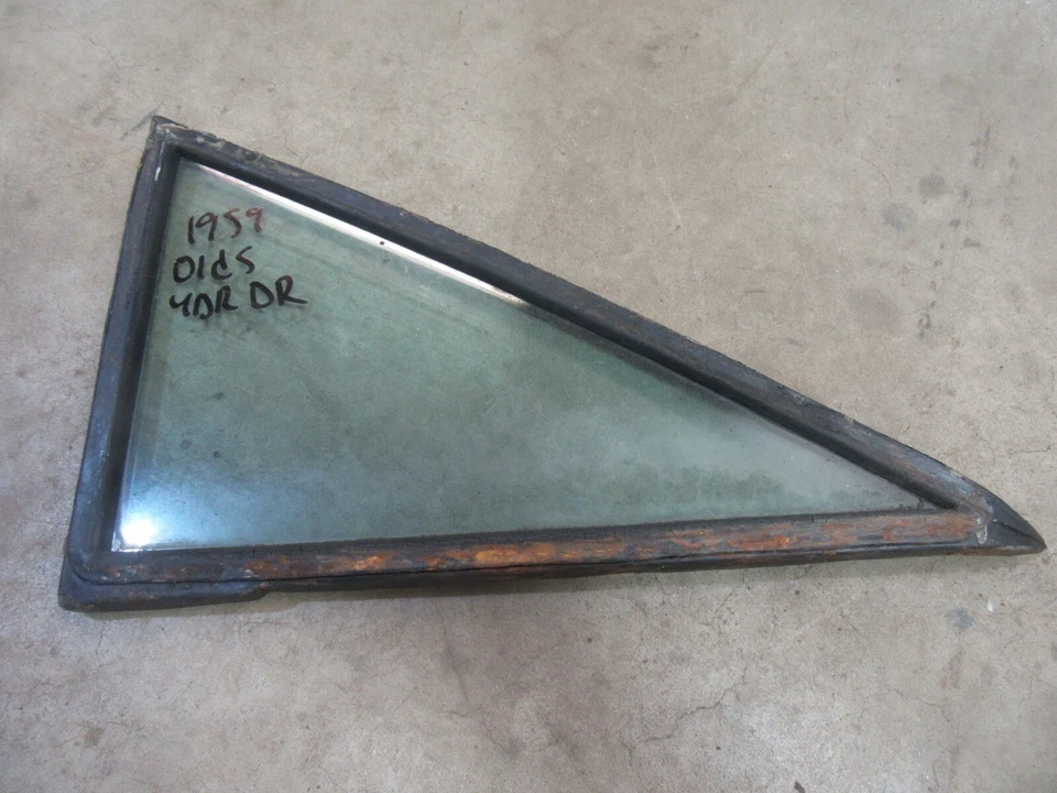 1959 Oldsmobile Dynamic 88 4 door sedan rear quarter window tinted glass D - Image 1 of 1