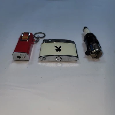 3 Vintage Cigarette Lighters; Playboy, Spark Plug,and Gas Pump. Good Condition  - Image 1 of 4