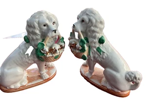 Antique pair of Staffordshire Ceramic poodles carrying baskets of puppies - Picture 1 of 3