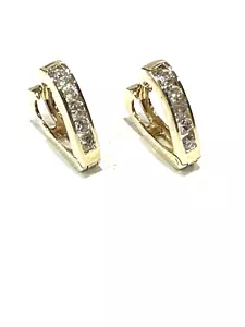 14kt.yellow gold huggie earrings with white sapphaire. - Picture 1 of 5
