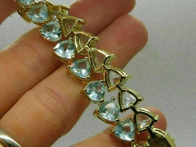 12Ct Trillion Cut Simulated Aquamarine Tennis Bracelet 14K Yellow Gold Plated - Image 1 of 3